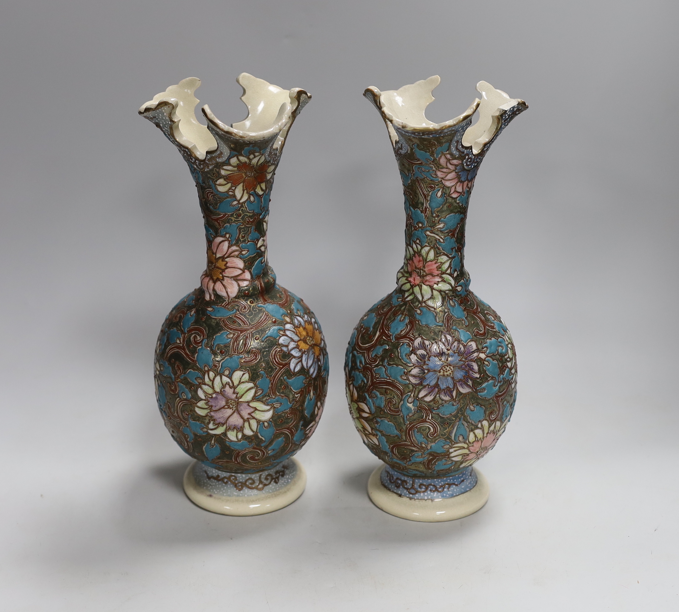 A pair of Japanese moriage pottery vases, 30cm high